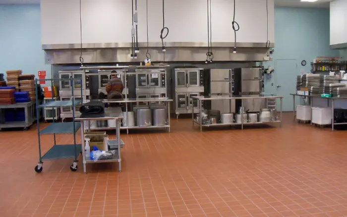 Commercial kitchen extraction canopy with gas interlock wiring in restaurant fit-out, Buckinghamshire